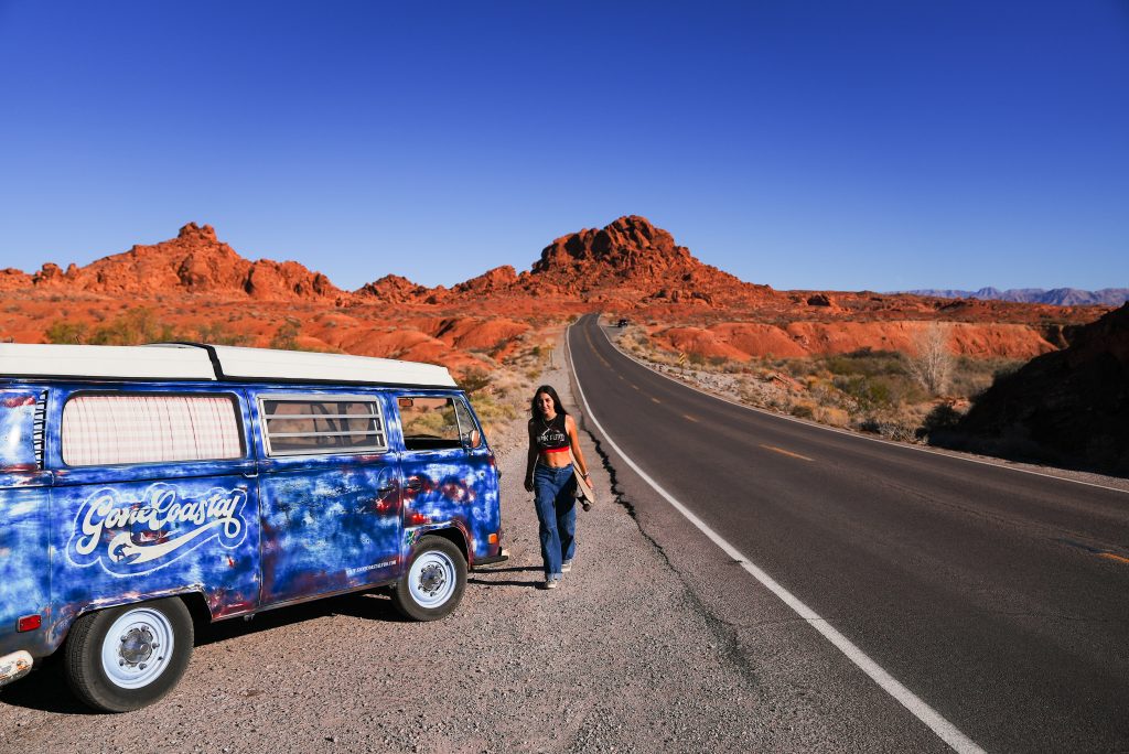 VW bus driving valley of fire with Daphne Severn